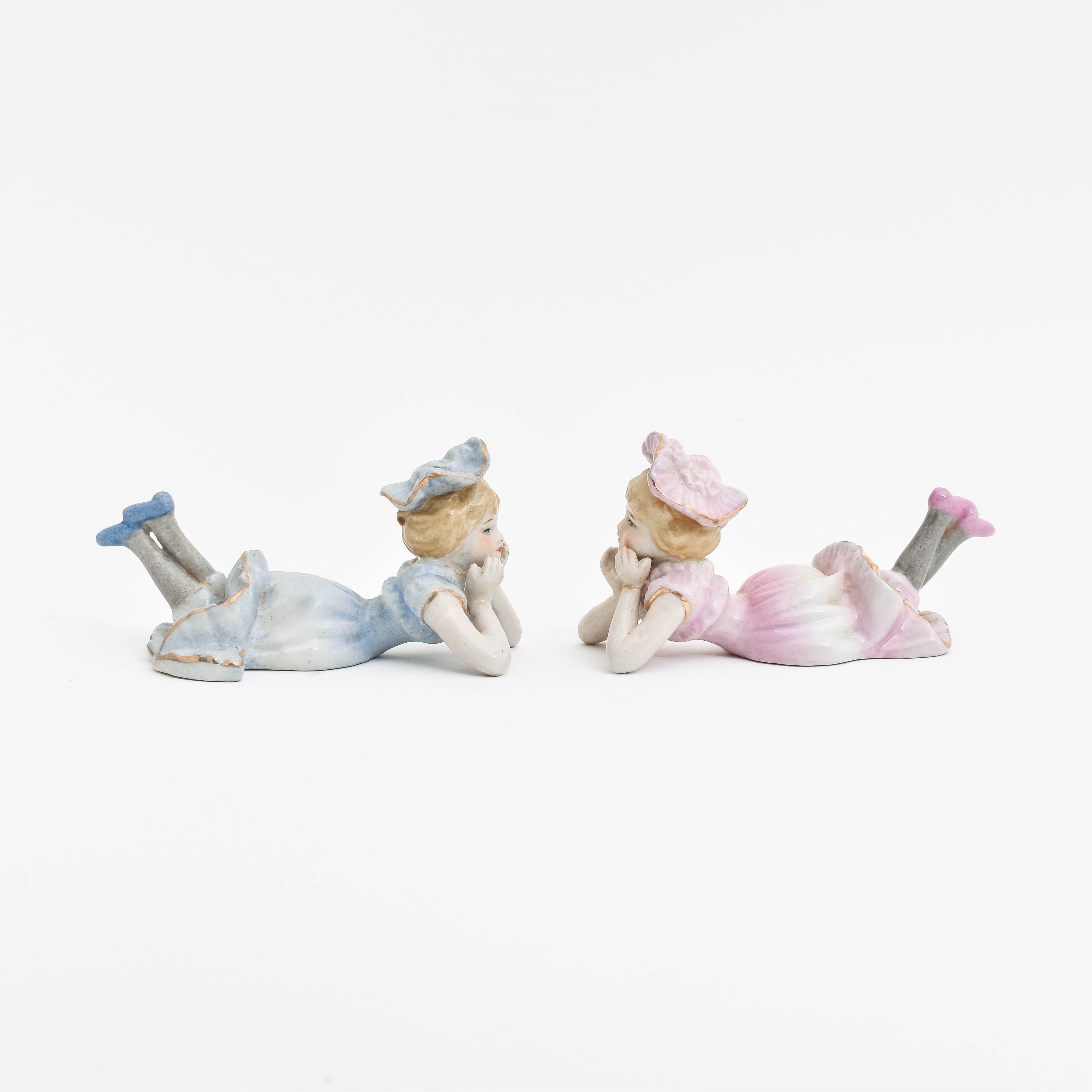 Lot de 2 figurines en porcelaine Jumeaux