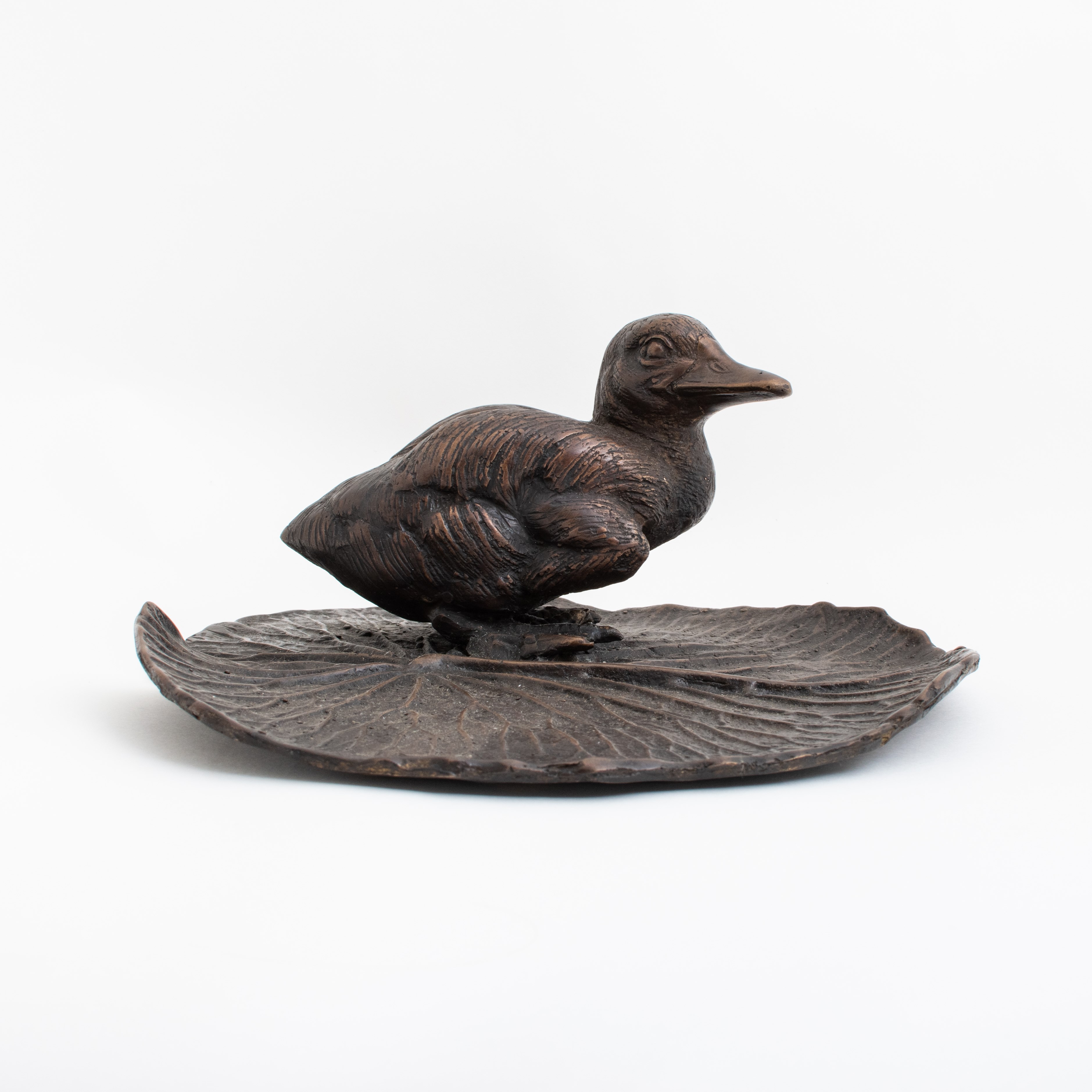 Sculpture Canard sur Feuille de Nénuphar